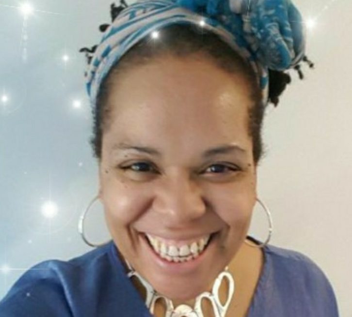 Laura Starz smiling magic sparkles surrounding frame